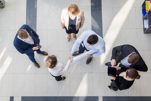 High angle view of business people in hallway